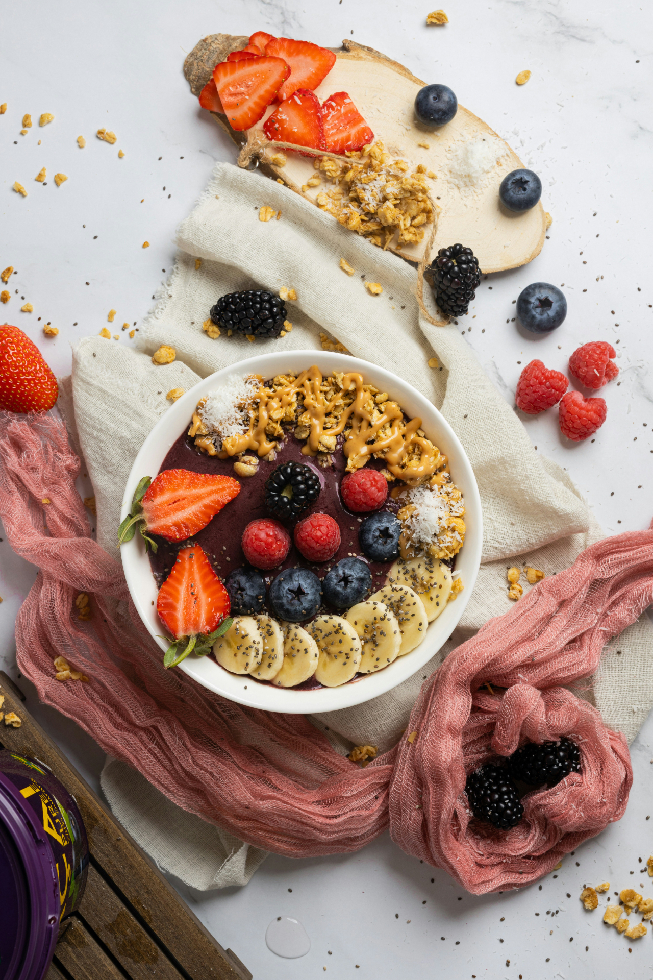 aesthetic açaí bowl with berries and flowers