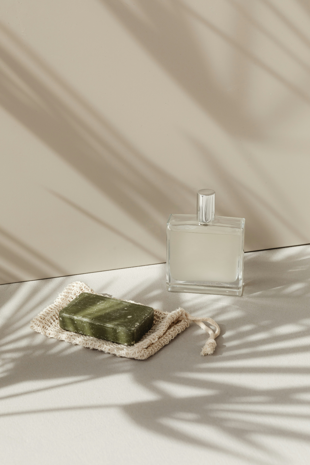 natural soap and perfume on a sunlit surface
